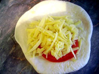 Пирожки с сыром и помидорами
