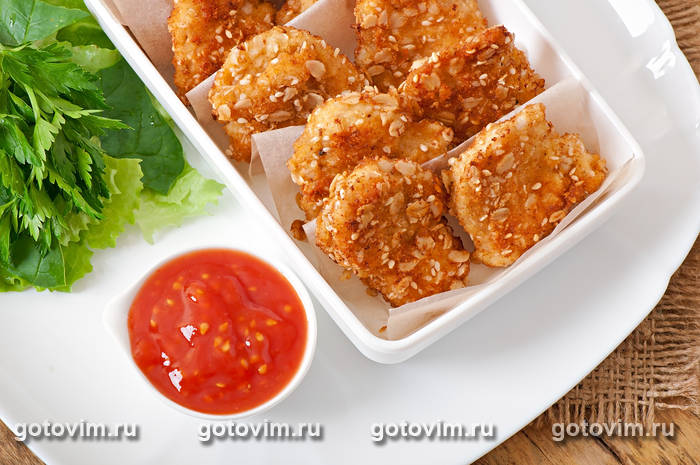 Куриные наггетсы в кунжутной панировке Куриные наггетсы в кунжутной панировке