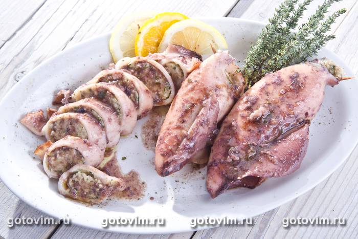 Кальмары, фаршированные рыбой и овощами Кальмары, фаршированные рыбой и овощами