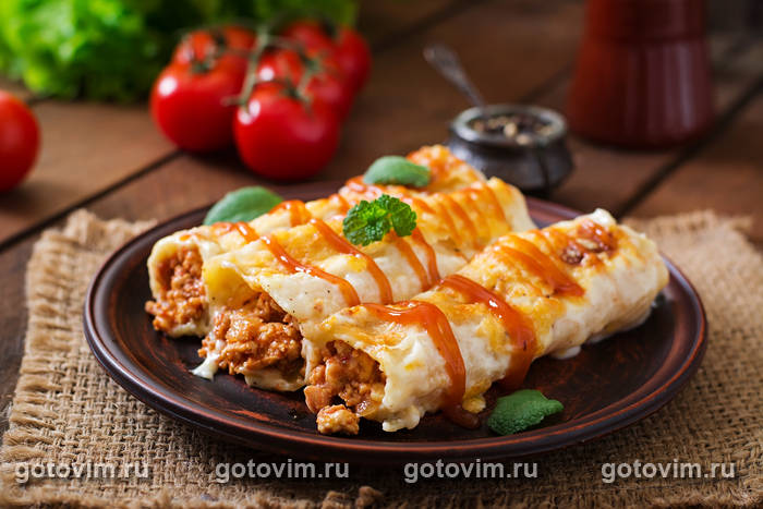 Каннеллони болоньезе под соусом бешамель Каннеллони болоньезе под соусом бешамель