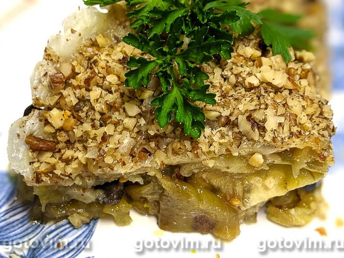 Баклажаны, запеченные с сыром, оливками и грецкими орехами. Фотография рецепта