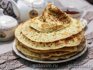 Толстые блины на сухих дрожжах со сливоч