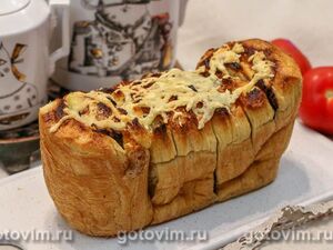 Отрывной хлеб-гармошка с сыром и ветчиной
