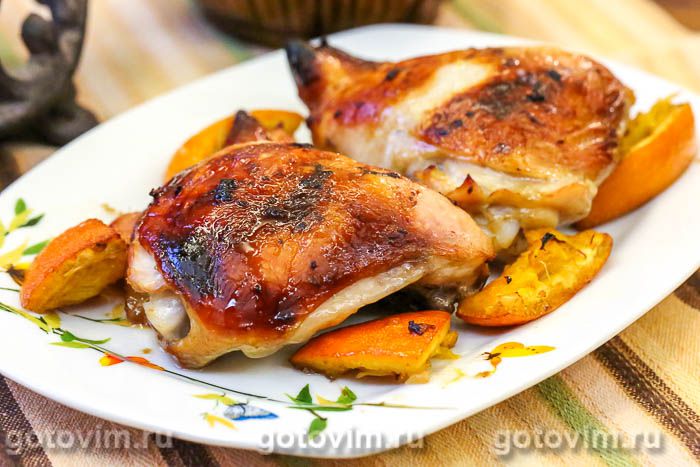 Куриные бедра, запеченные с апельсиновым маринадом. Фотография рецепта