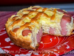 Закусочный торт из картофеля с сосисками, сыром и помидорами – кулинарный рецепт