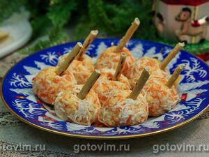 Закусочные шарики с соленой сельдью и морковью